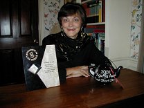 Marcia with her Agatha Award teapot