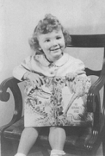 Marcia age 3 with book